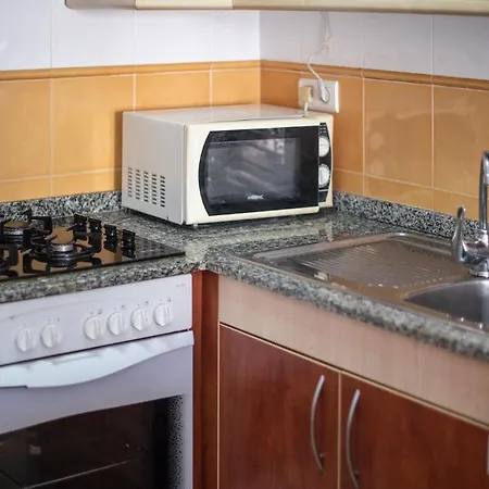 R129 Con Terraza Y Piscina Comunitaria Cerca De La Playa